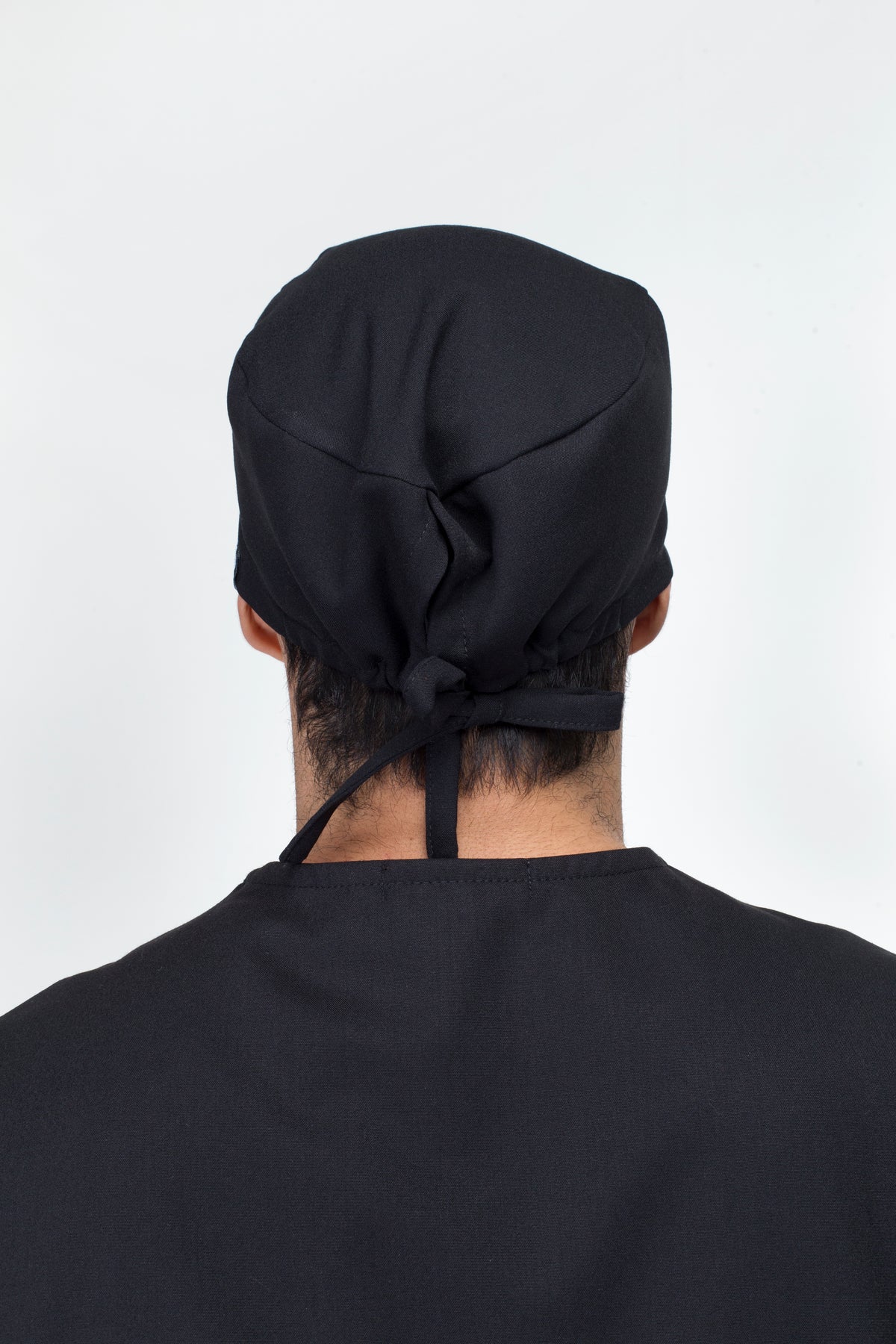 Back view of Black Men’s Surgical Cap showing the adjustable tie and full hair coverage