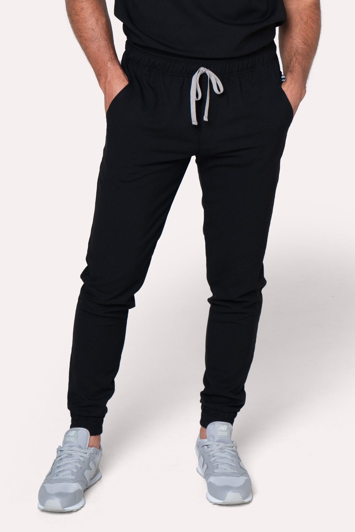 Man wearing Fresh Black Scrub Pants by Work & Chill