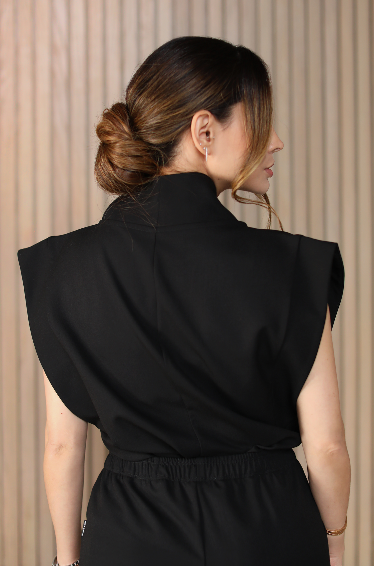 Back view of Kate Black Scrub Top by Work & Chill