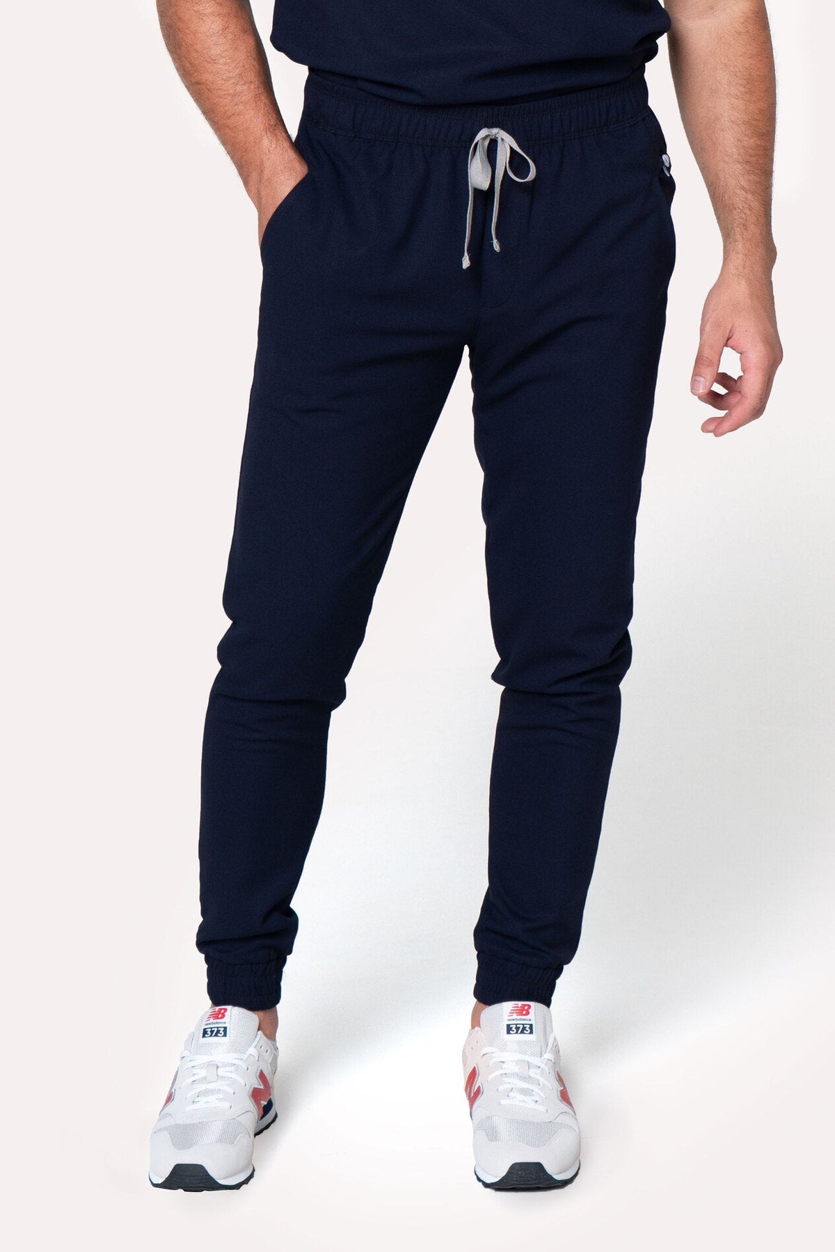 Man wearing Fresh Navy Scrub Pants by Work & Chill