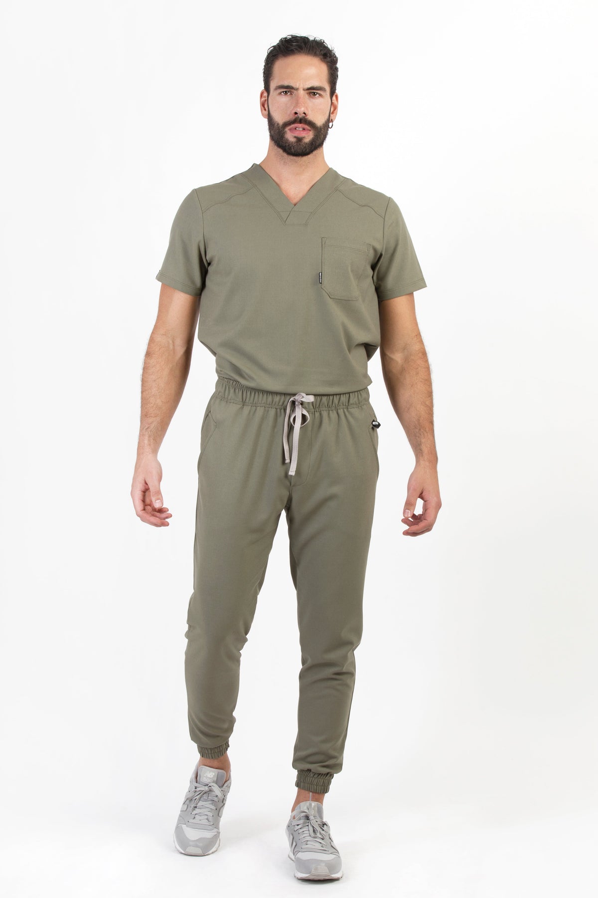 Model wearing Fresh Olive Scrub Pants with matching Fresh Scrub Top