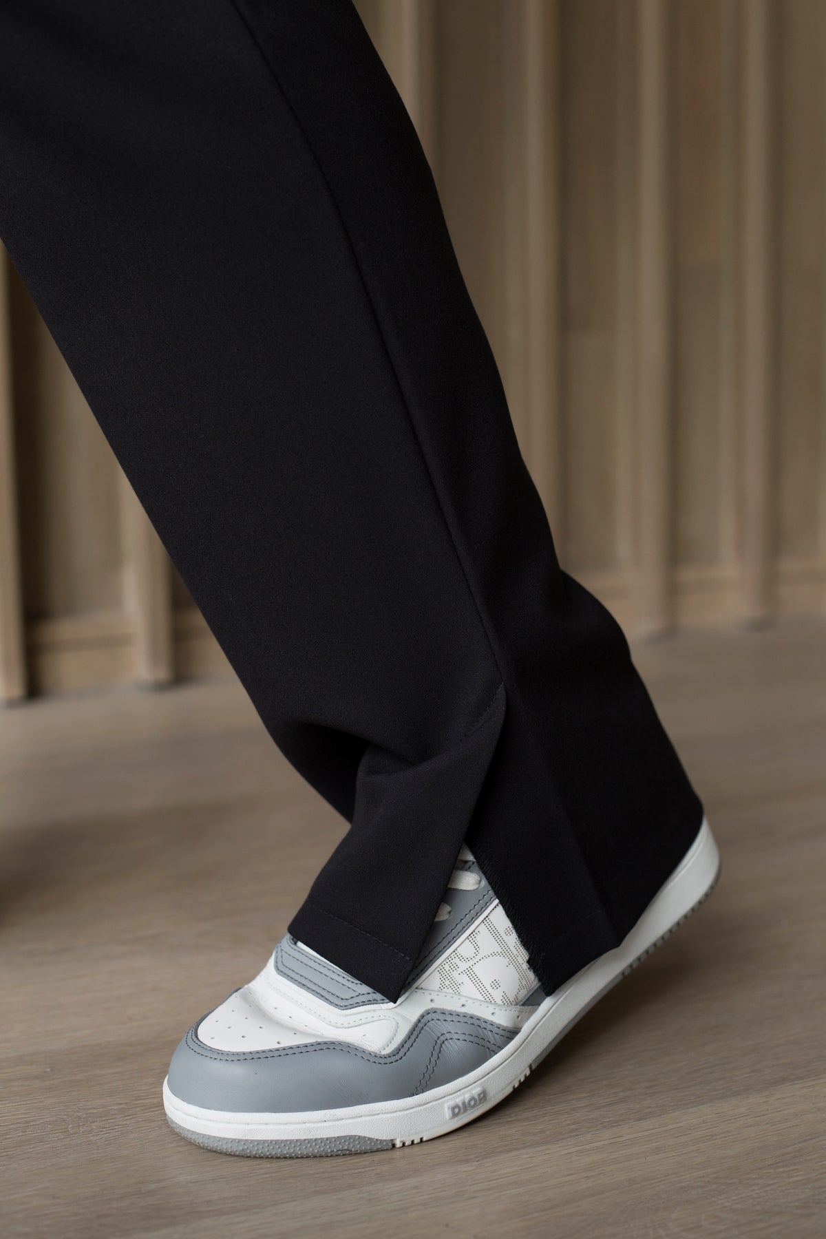 Detail of Harry Black Scrub Pants showing the straight-leg fit