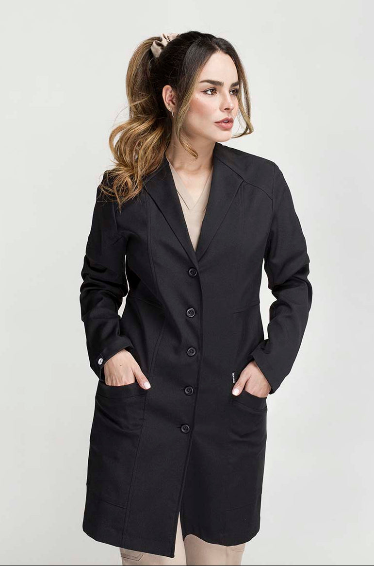 Woman wearing Women’s Black Medic Coat showing the polished professional fit