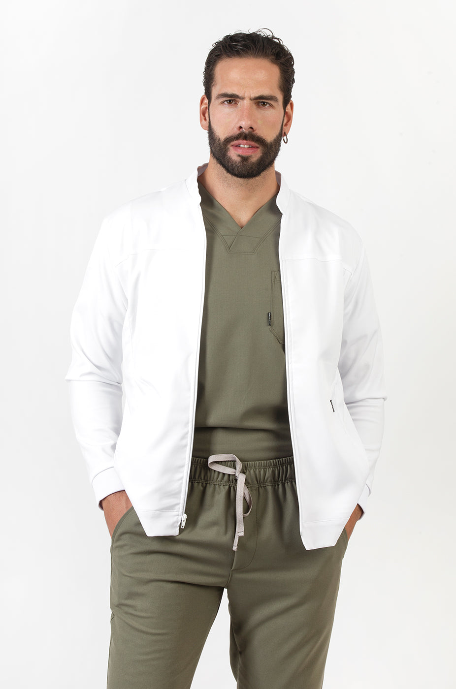 Man wearing Fresh Olive Scrub Top under a white medical coat